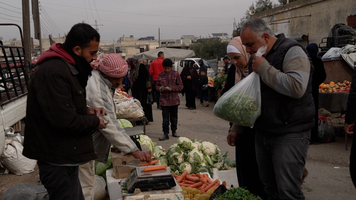 refugiados sírios no mercado